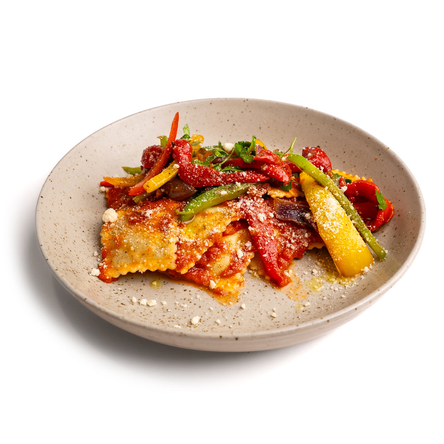 Sausage & Cheese Ravioli with Marinara, Peppers & Caesar Salad